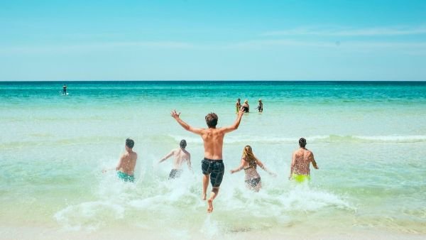 Young people enjoying themselves on the beach